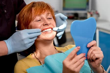 How are cavities treated?